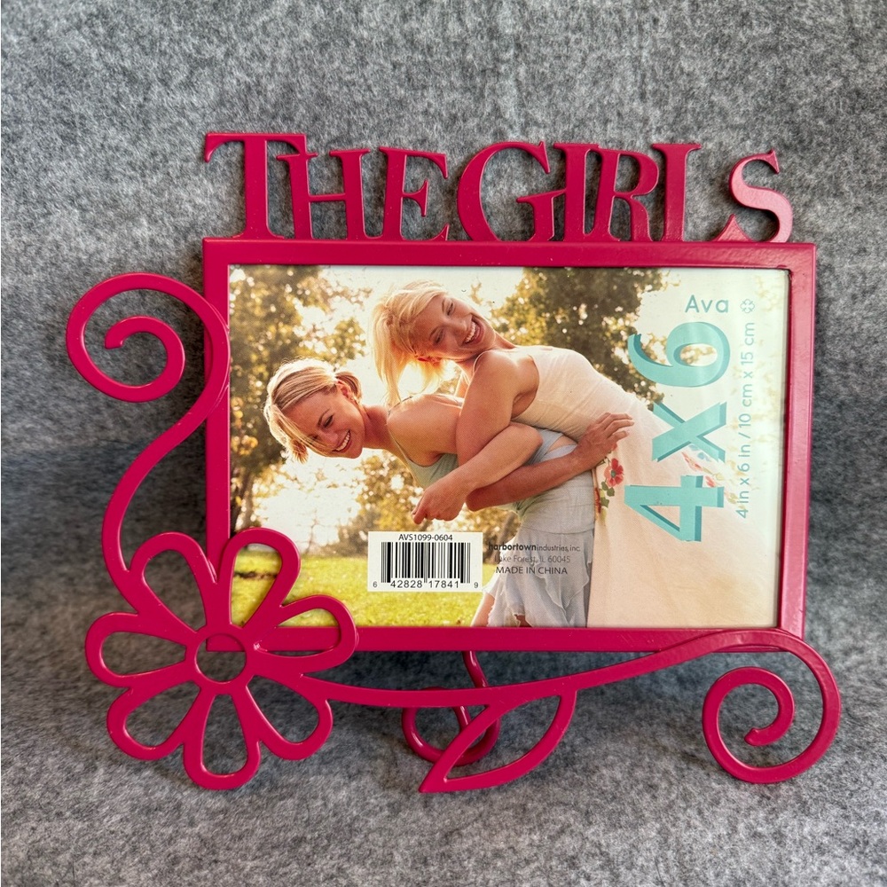 Harbortown Industries “THE GIRLS” 4x6 Ava Pink Picture Frame sits on a Flower